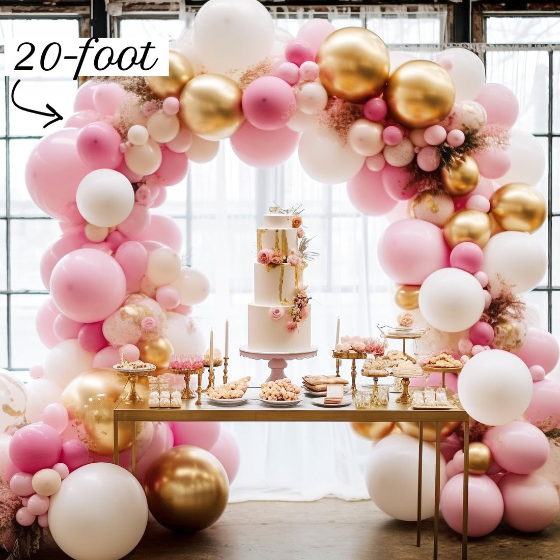 20ft pink, white and gold balloon garland arching over a dessert table, labeled 20-foot