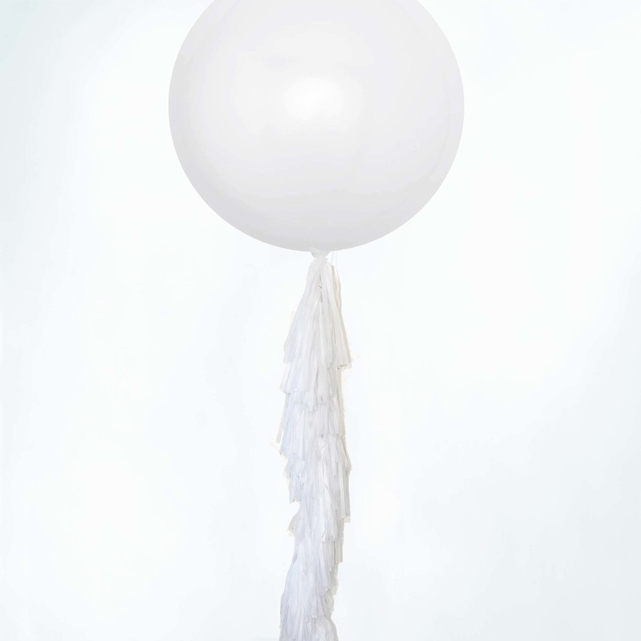 White paper tassel tails