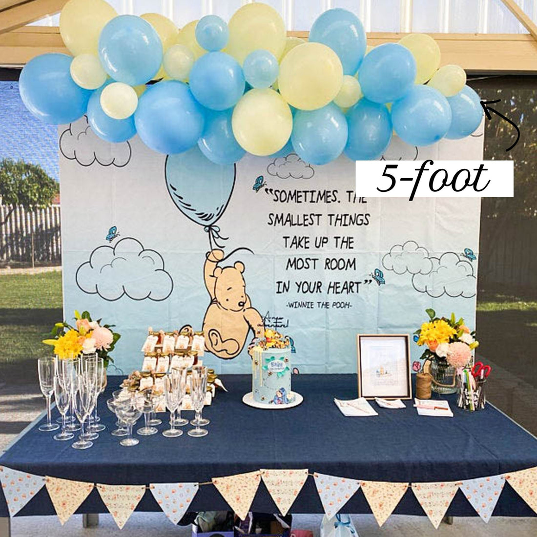 Pastel blue and yellow balloon garland kit for First Bee Day Winnie the Pooh baby shower 1st birthday party