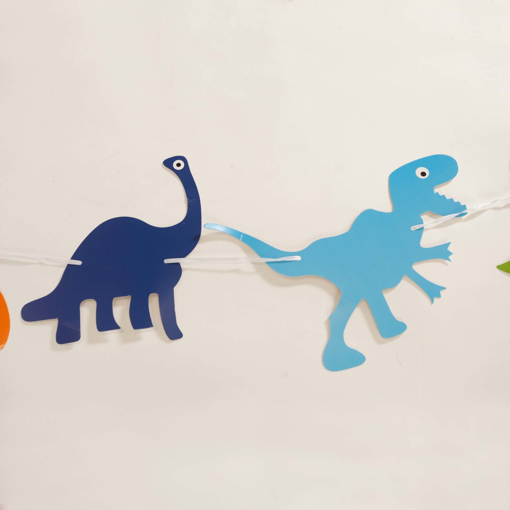 Dinosaur Party Banner in Blue, Green, and Orange (8-Foot) - Ellie's Party Supply