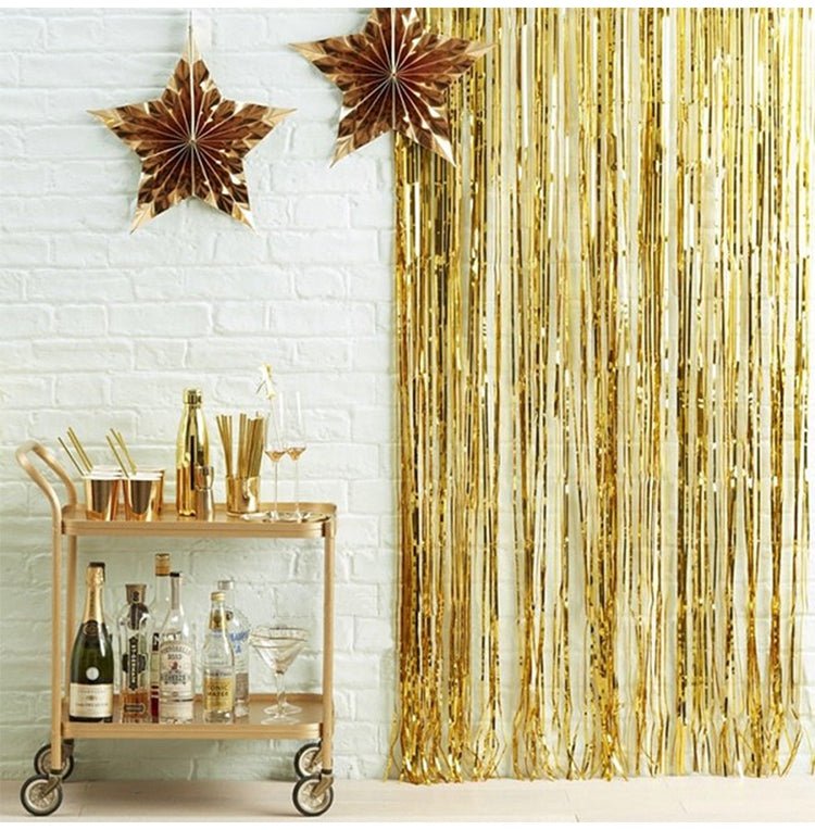 Gold Fringe Tinsel Curtain Backdrop (2 pack) from Ellie's Party Supply